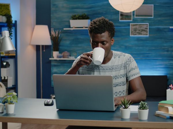 Freelance employee working from home on laptop